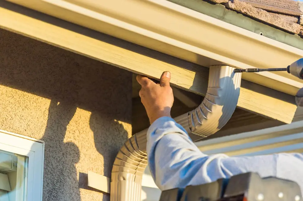 Rain gutter installation on a Utah home